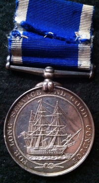An Unusual Victorian Long Service Good Conduct medal. To:  WILLIAM H. PILE, NL SCHOOLMr HMS IMPREGNABLE.
( Naval Schoolmaster ) 