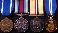A Good NATO (Yugoslavia) O.S.M. 2000 (Afghanistan) IRAQ (Operation TELIC)  Golden Jubilee group of four. To: (C.8020215) Chief Technician A.P. ROBINS. R.A.F. (Served with 31 Squadron RAF, on Tornados) With miniatures.