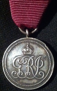 MEDAL OF THE ORDER OF THE BRITISH EMPIRE. THE SCARCE EARLY AWARD (Only 2000 awarded) Currently wearing the civil ribbon. Unnamed as issued