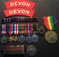 An Outstanding "12th SS MURDER DIVISION" MILITARY MEDAL 
with T.F.E.M. To: 6206751 Cpl E.J. SIGALL. 2/DEVON. REGt, (7th Div.) who on 26th April 1945 took on two units of the infamous 12th SS Panzer "Murder" Division, 