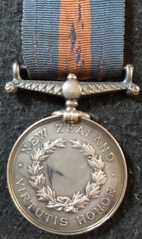 AN ATTRACTIVE & ORIGINAL NEW ZEALAND MEDAL.
To: 2088. D. Mc.LAREN. 99th (Lanarkshire) REGt.
Served in NZ in 1851. GVF, Uncleaned on original ribbon.