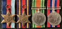 A VERY DESIRABLE & EARLY (1912) “LIVERPOOL SHIPWRECK & HUMANE SOCIETY’S FIRE MEDAL“ With colour photo of recipient in later life.To: JAMES BAXENDALE-MOSS.With CASUALTY son’s WW2  medals.