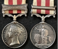 A Rare,  INDIAN MUTINY MEDAL, (DEFENCE OF LUCKNOW), “AN ORIGINAL DEFENDER”-DIED OF WOUNDS 1st September 1857.
(A Battle of Chinhut Wounded Casualty) To: CPL HENRY DYMOCK 32nd Foot Regt.